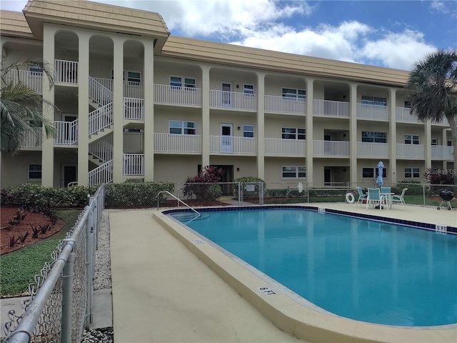 community pool featuring a patio