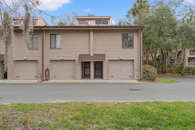 exterior space with a garage