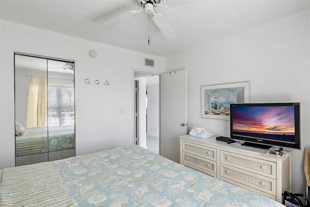 bedroom featuring a ceiling fan, a closet, and visible vents