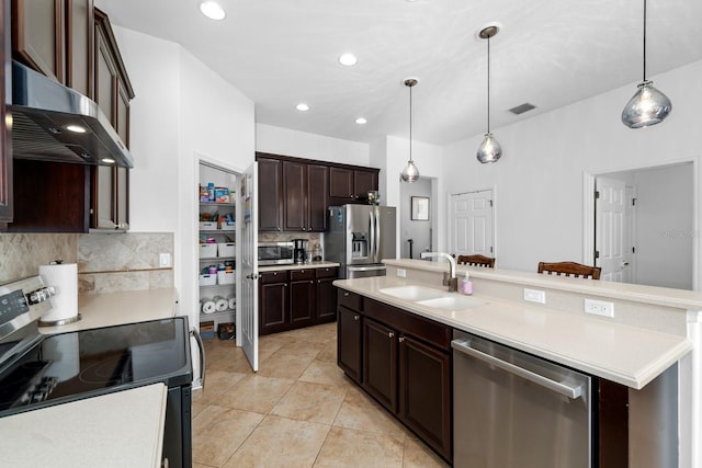 6157 Castleton Hollow Rd, Riverview, FL 33578 - kitchen featuring stainless steel appliances, a sink, decorative backsplash, light countertops, and dark brown cabinets