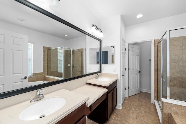 6157 Castleton Hollow Rd, Riverview, FL 33578 - bathroom featuring a shower stall, vanity, a bath, and tile patterned flooring