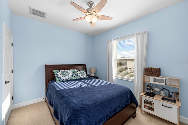 6157 Castleton Hollow Rd, Riverview, FL 33578 - bedroom with light carpet, baseboards, and ceiling fan