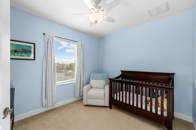 6157 Castleton Hollow Rd, Riverview, FL 33578 - bedroom featuring carpet, baseboards, a ceiling fan, and a nursery area