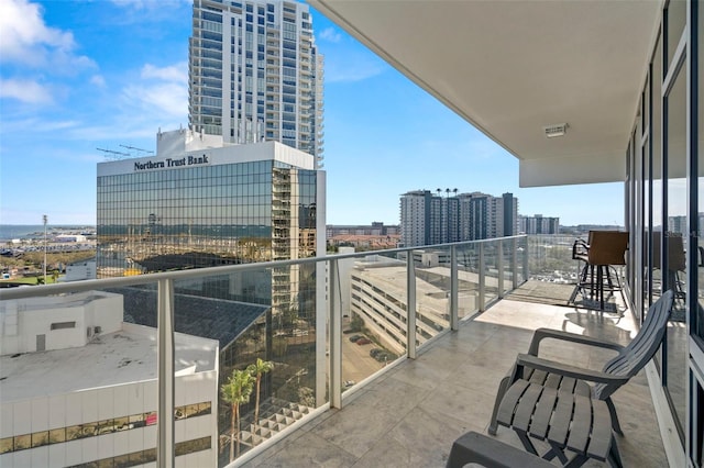 balcony featuring a city view