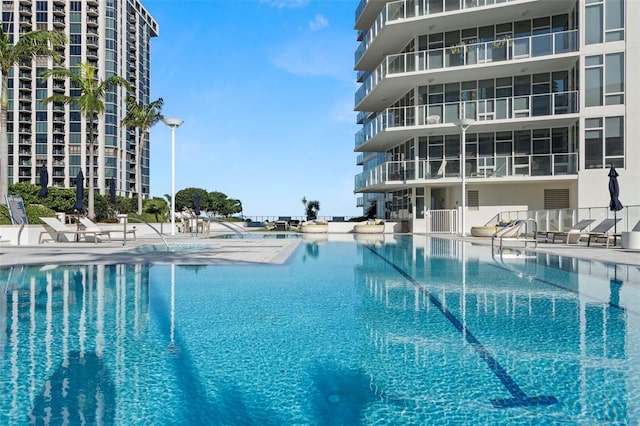 community pool featuring a patio area