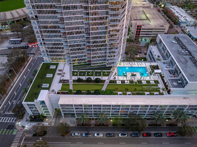 birds eye view of property featuring a city view