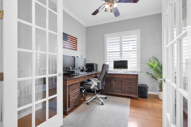 office area with ceiling fan, light wood-style flooring, baseboards, ornamental molding, and french doors