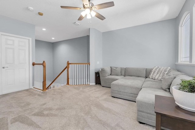 living room with ceiling fan, carpet, and recessed lighting