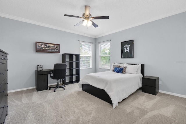 bedroom featuring baseboards, ornamental molding, and carpet flooring