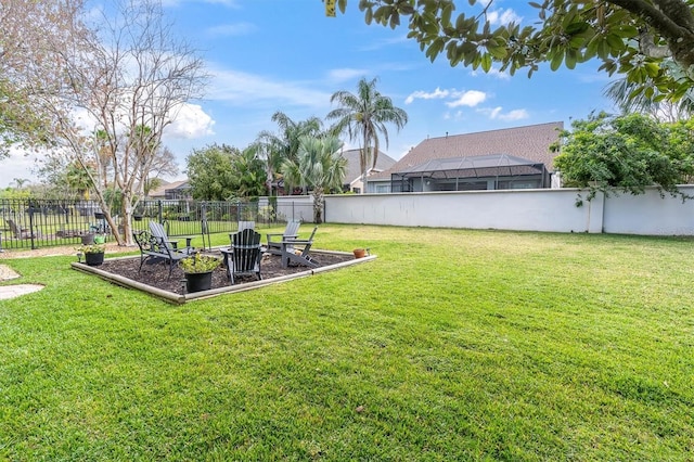 view of yard with a fenced backyard