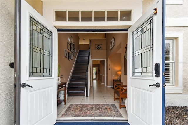 property entrance featuring stucco siding