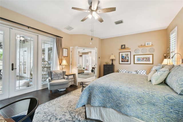 bedroom featuring access to exterior, visible vents, french doors, and wood finished floors