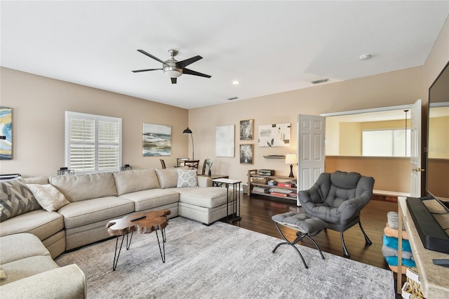 living area with ceiling fan, visible vents, wood finished floors, and recessed lighting