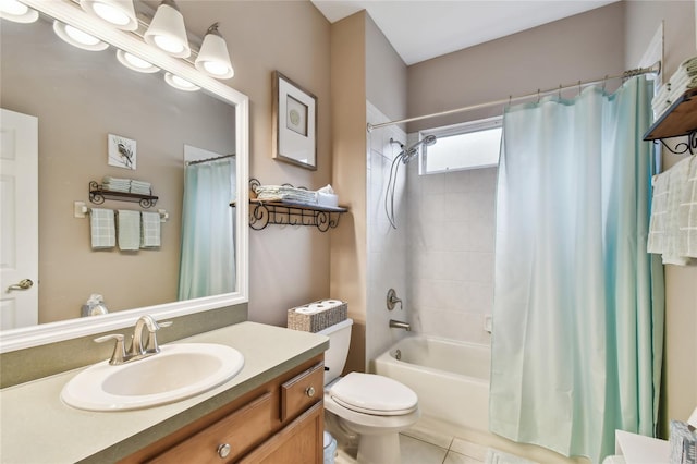 full bathroom featuring tile patterned floors, toilet, vanity, and shower / bath combination with curtain