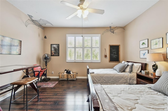 bedroom with baseboards, ceiling fan, and dark wood-style flooring