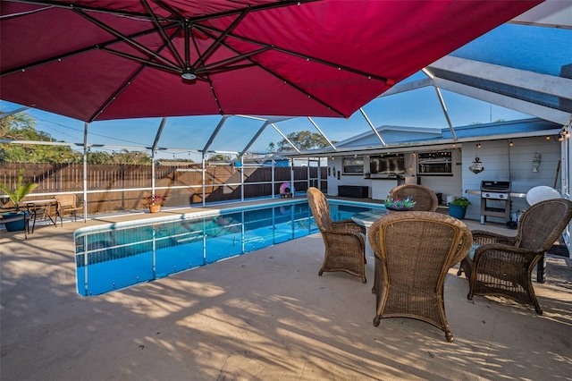 view of swimming pool featuring a fenced backyard, a patio area, a lanai, and a fenced in pool