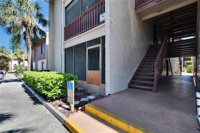 view of property with stairway