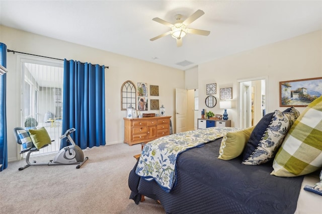 bedroom featuring visible vents, baseboards, ceiling fan, ensuite bathroom, and carpet floors