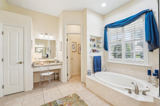 full bath with a garden tub, tile patterned flooring, a closet, and vanity