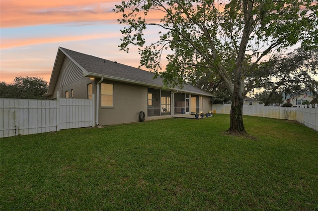 view of yard with a fenced backyard