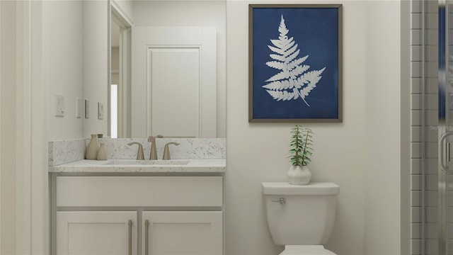 bathroom featuring toilet, an enclosed shower, and vanity