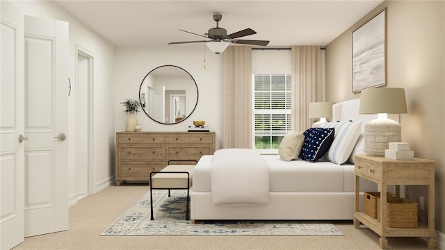 bedroom featuring light colored carpet, ceiling fan, and baseboards