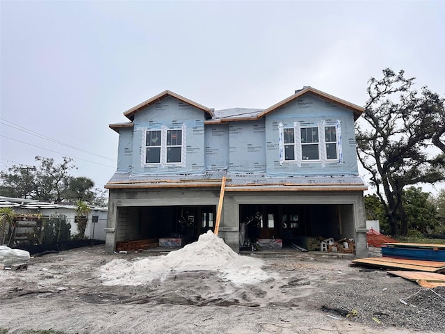 property under construction featuring a garage