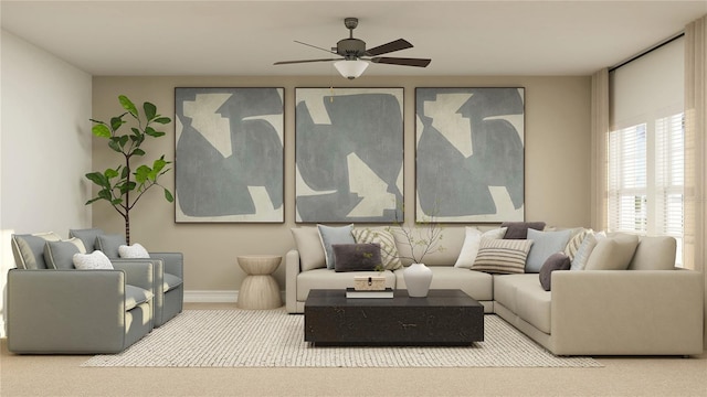 carpeted living room featuring ceiling fan and baseboards