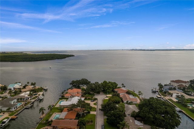 bird's eye view with a residential view and a water view