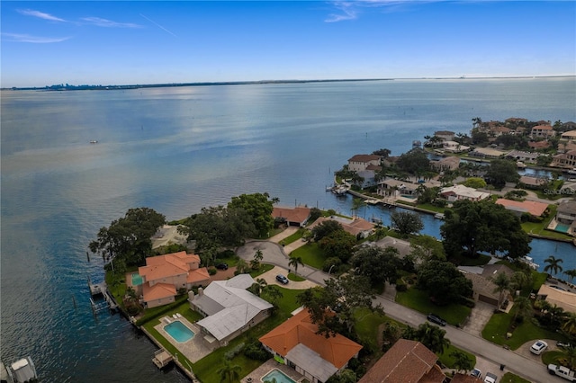 bird's eye view with a water view and a residential view