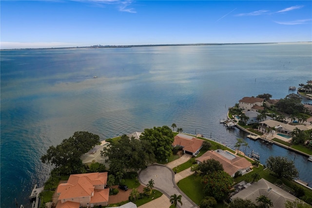 bird's eye view with a water view and a residential view