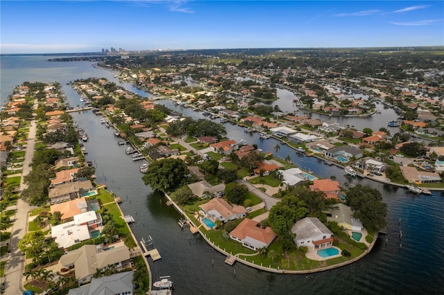 bird's eye view featuring a residential view and a water view