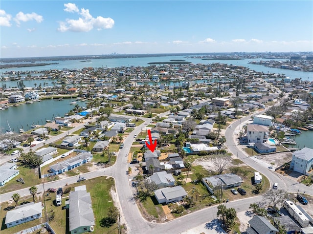 aerial view featuring a water view and a residential view