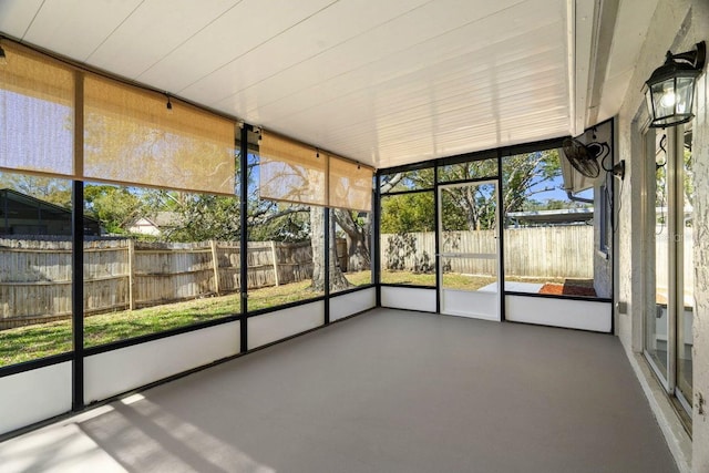 unfurnished sunroom with a healthy amount of sunlight