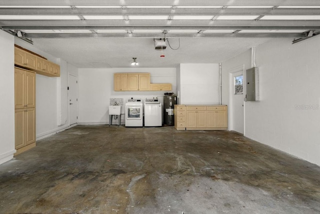 garage with washing machine and dryer, electric water heater, a sink, electric panel, and a garage door opener