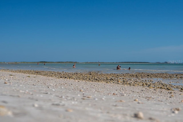 property view of water featuring a view of the beach