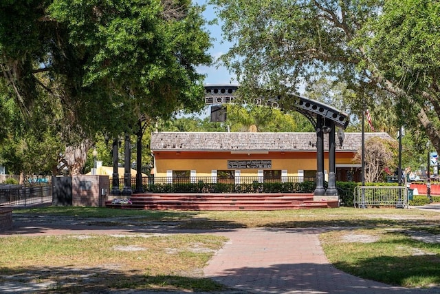 view of property's community featuring fence