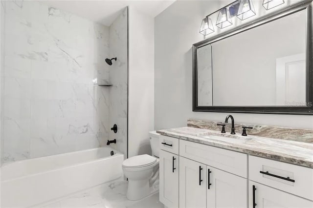 full bath featuring toilet, marble finish floor, bathtub / shower combination, and vanity