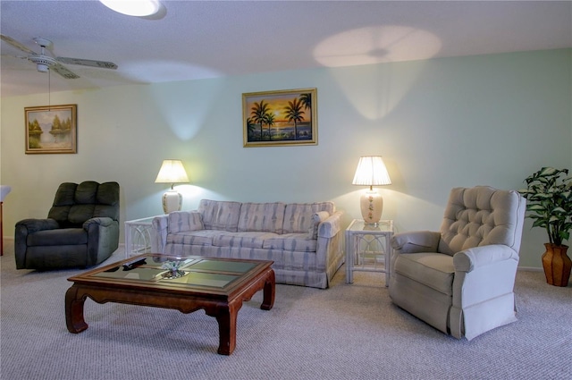 living room with carpet floors and a ceiling fan