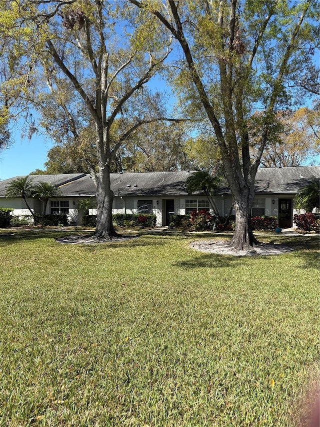 exterior space with a front yard