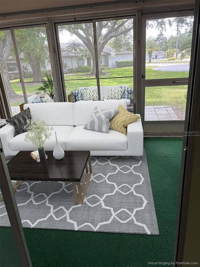 860 Glen More Ct Unit B, Palm Harbor, FL 34684 - sunroom / solarium with an outdoor hangout area
