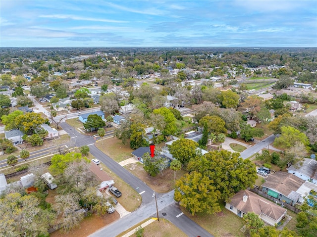 birds eye view of property with a residential view