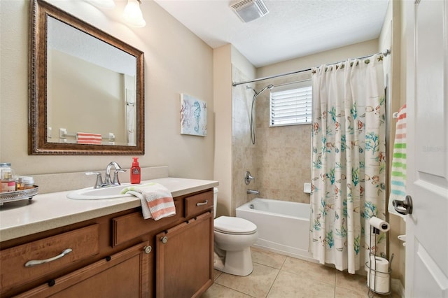 full bathroom with shower / tub combo, visible vents, toilet, tile patterned flooring, and vanity