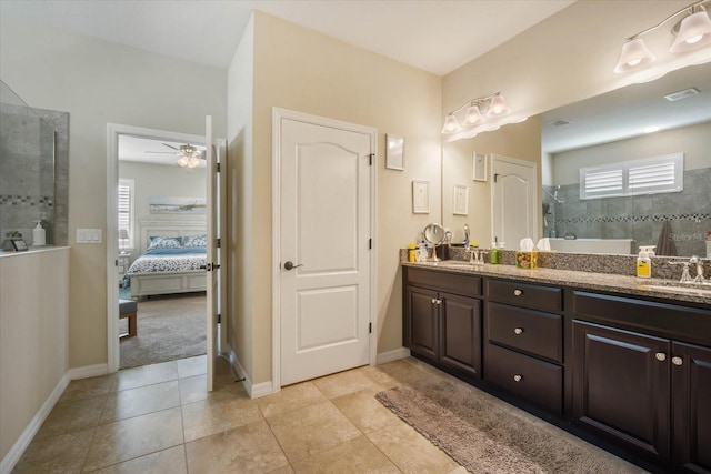 ensuite bathroom featuring double vanity, visible vents, ensuite bath, a walk in shower, and tile patterned flooring