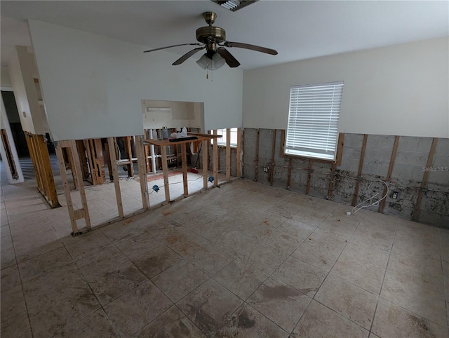 unfurnished room featuring a ceiling fan