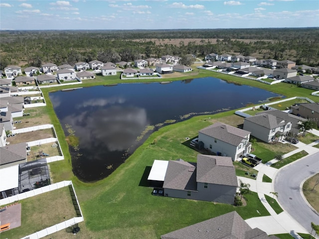 bird's eye view with a residential view and a water view