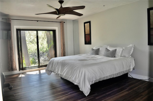 bedroom with wood finished floors, a ceiling fan, and baseboards