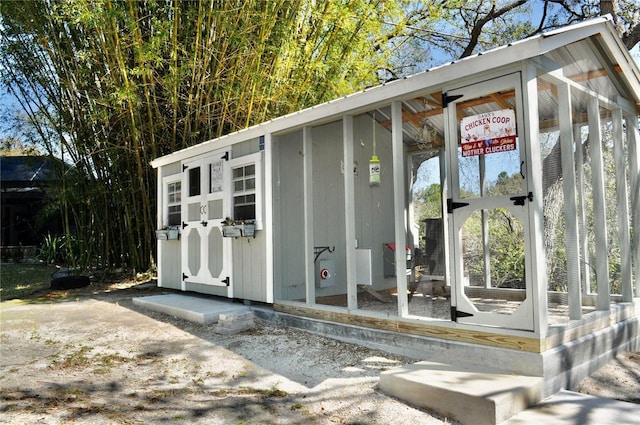 view of outbuilding with an outdoor structure