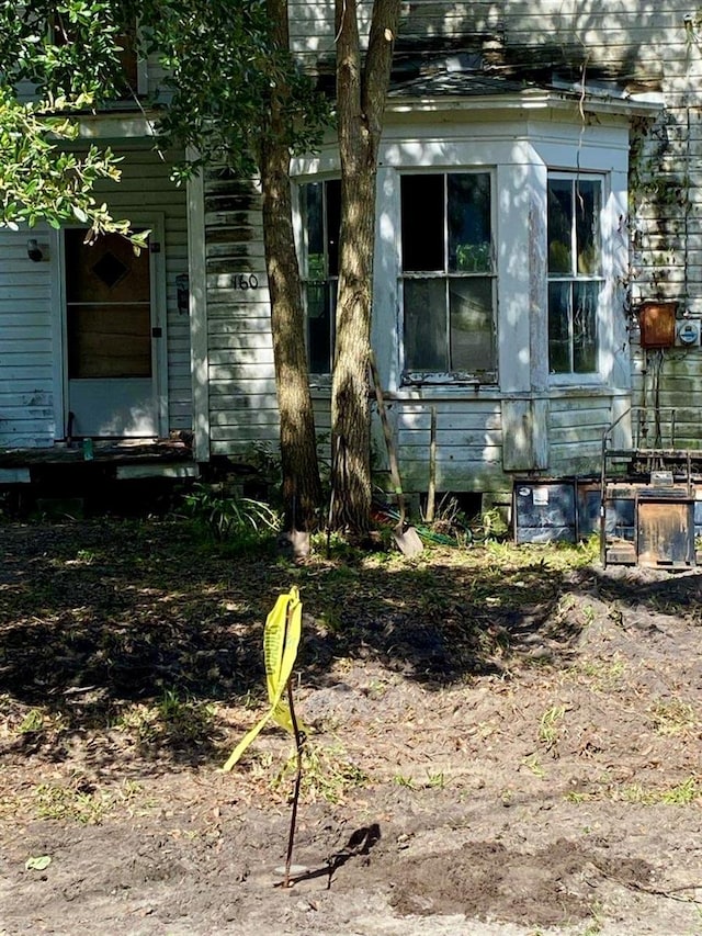 view of property exterior with entry steps