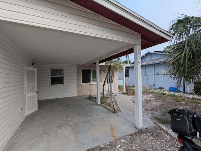 view of patio featuring a carport